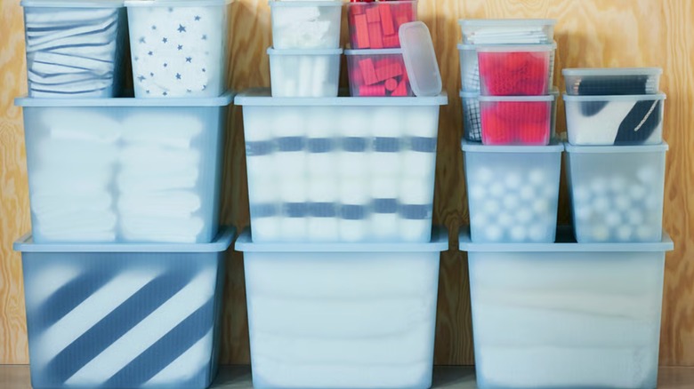 Blue transparent IKEA RYKTA bins stacked on top of each other