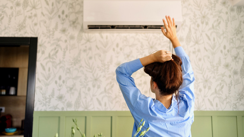 Person enjoying air conditioning
