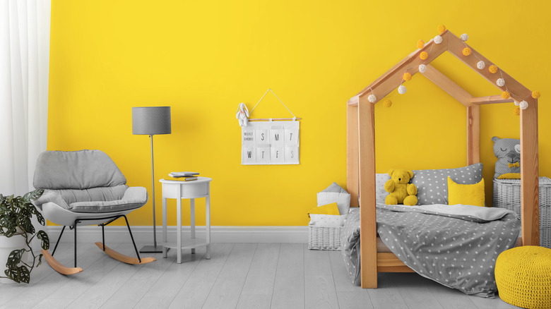 yellow child's room with bed