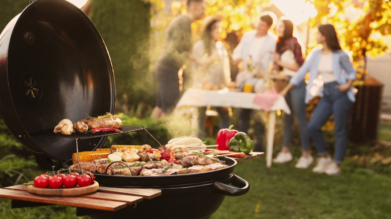 Round grill with food cooking