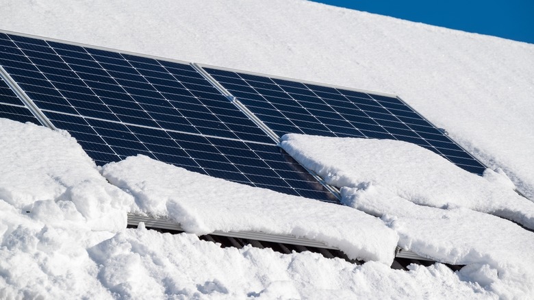 Solar panels covered in snow