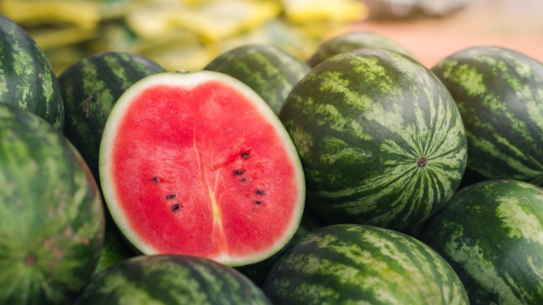 watermelon on stack of watermelons