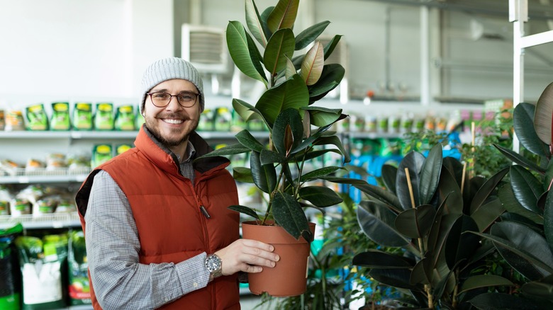 Man buys plant at store