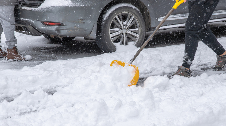 Person shoveling their driveway