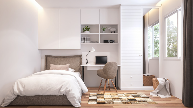 Small bedroom with white walls