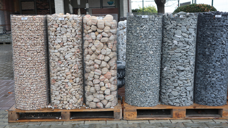 A display of the different types of gravel a landscape materials supplier sells.