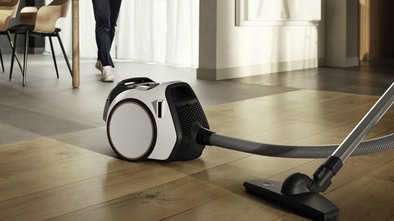 The Miele vacuum on a vinyl floor