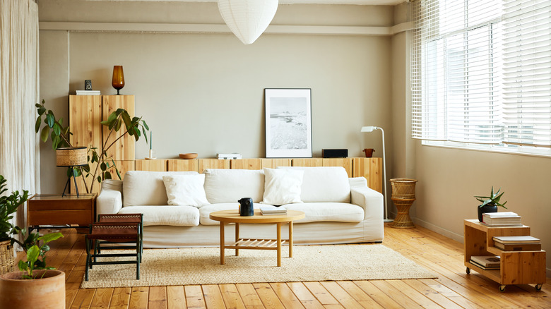 contemporary living room with yellow-toned wood floors