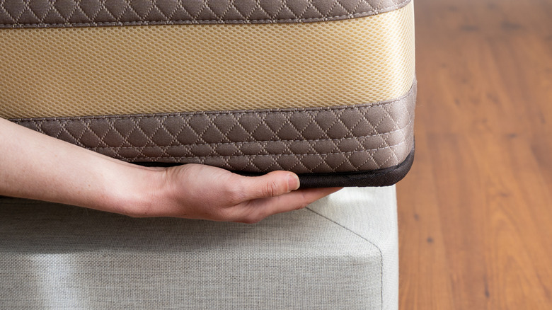 checking bed with box spring
