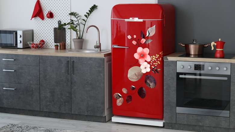 Colorful refrigerator in gray kitchen