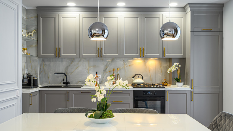 modern kitchen with gray cabinets