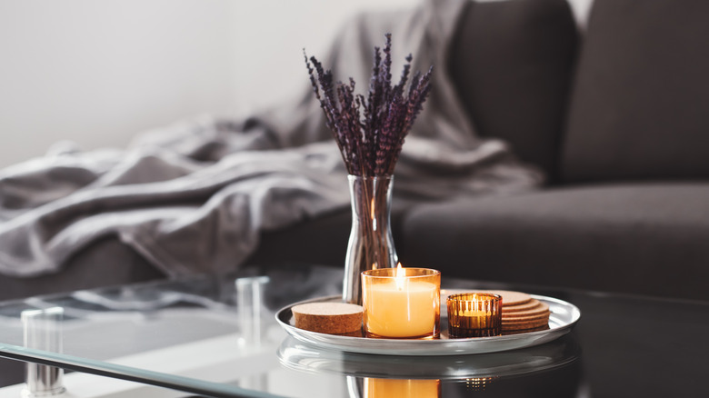 candles on glass table 