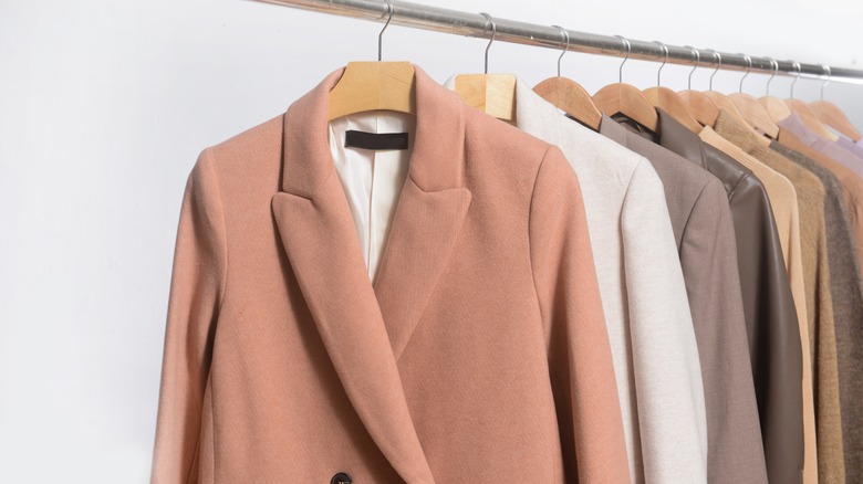 coats hanging on a rack