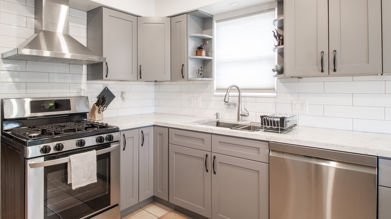 small kitchen with grey cabinets
