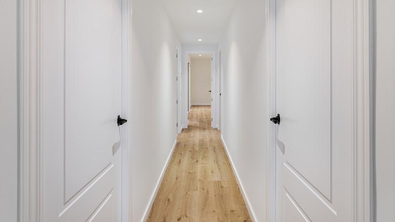 Narrow hallway with plain walls