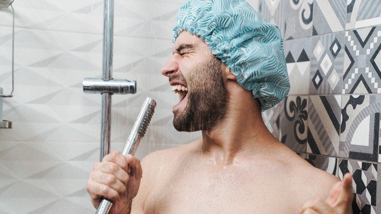 man singing in the shower