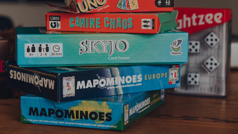 A stack of board games