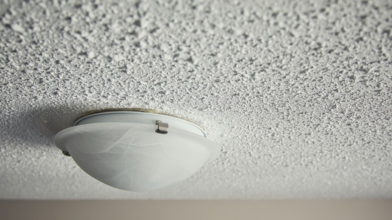 Popcorn ceiling and light fixture
