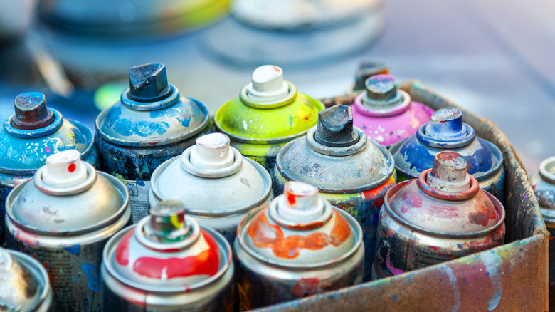 used spray paint cans