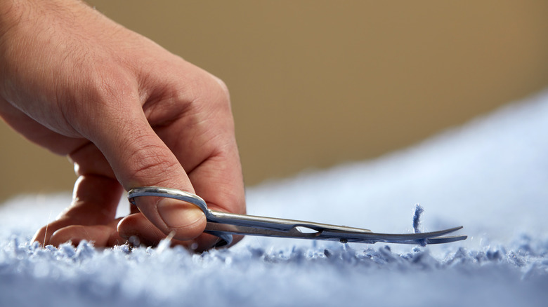 Cutting piece of carpet