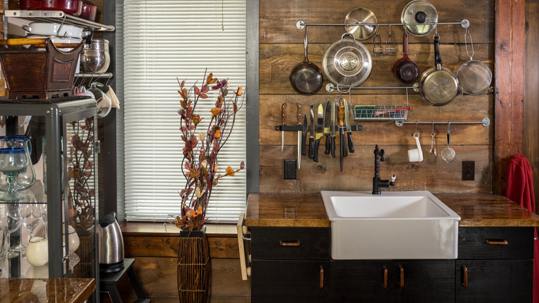 Kitchen with natural wood walls