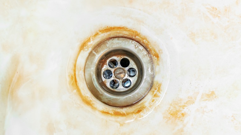 bathtub drain with rust stains