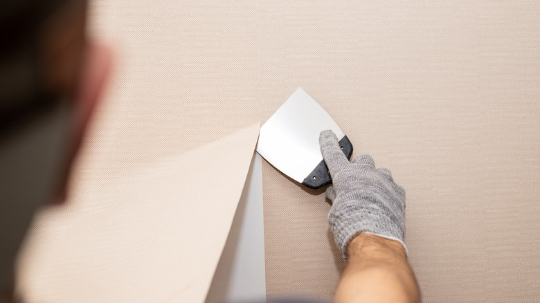 wallpaper paste or glue must be scrubbed and removed and then