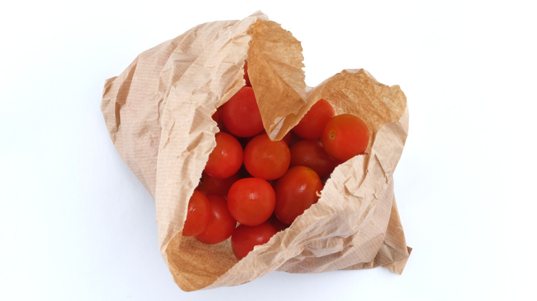 tomatos in a paper bag
