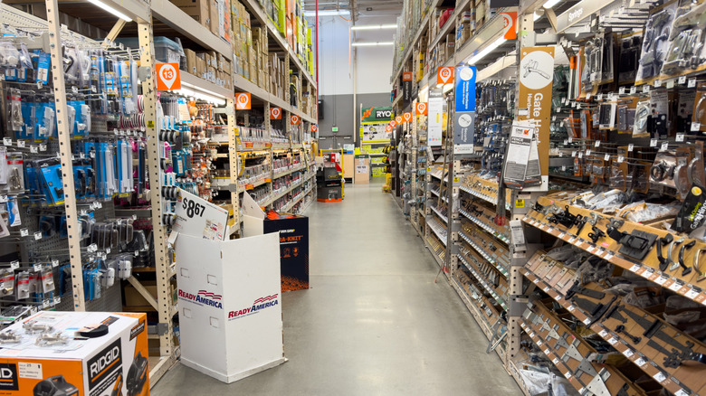 An aisle containing hand and power tools inside a Harbor Freight Tools store.