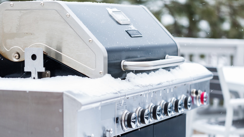 Grill covered in snow