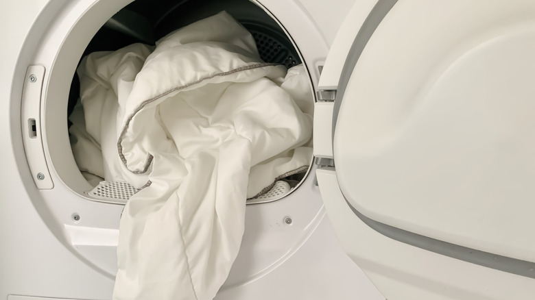 white blanket in washing machine