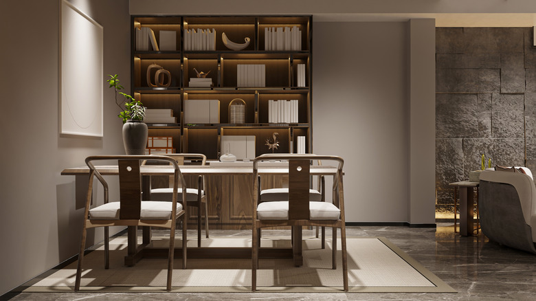 Organized shelving unit in a dining room space