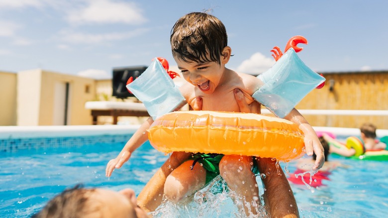 Playing with kids in pool