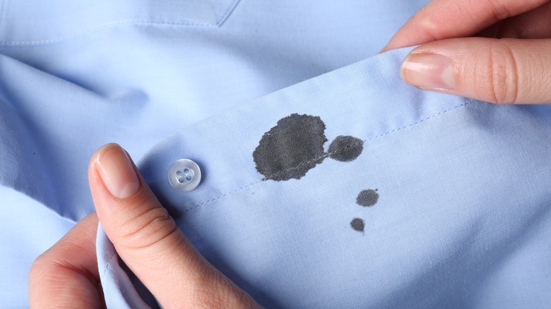 ink stain on blue shirt