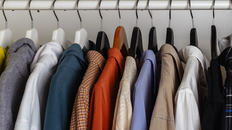 Clothes hung in closet