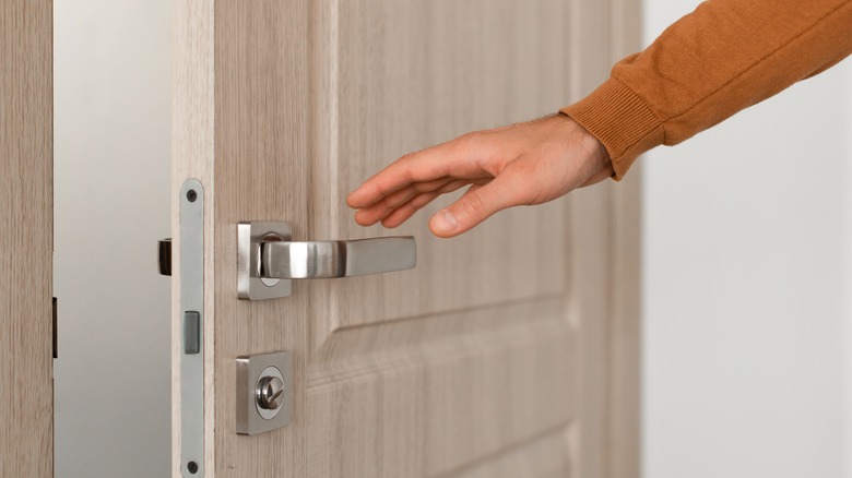 Securing front door with lock