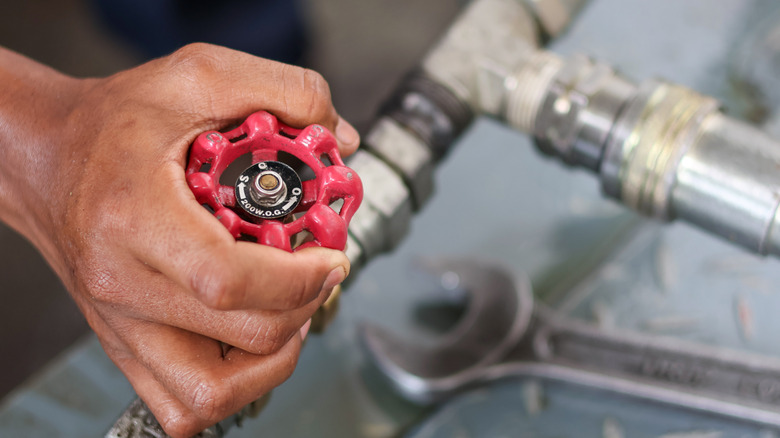 Turning knob on water supply valve