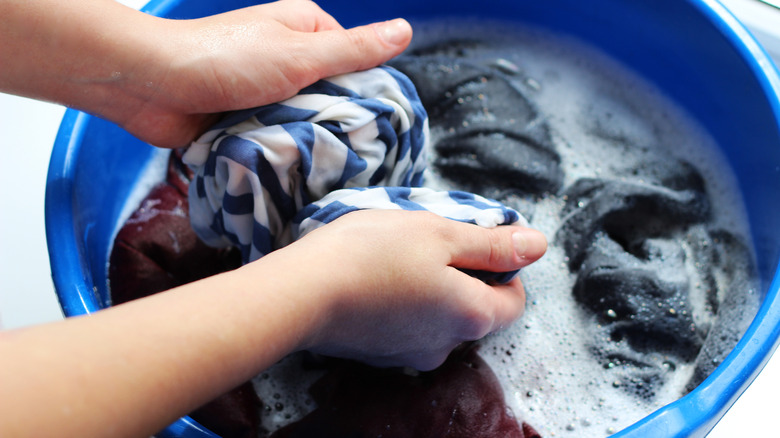 washing laundry in basin