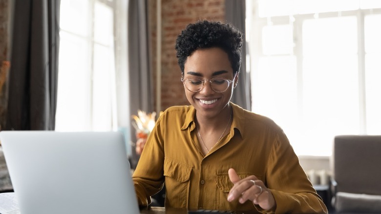 Young woman working on laptop