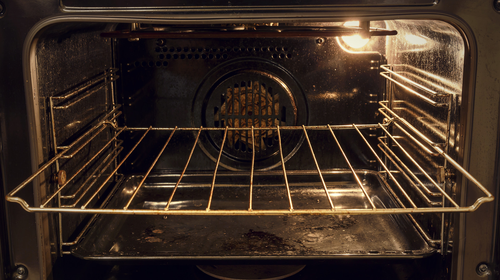 The Bizarre Grass Hack People Use To Clean Oven Racks (& Does It