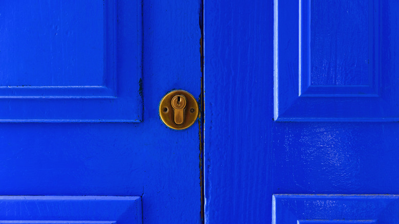 Ultramarine blue door with brass lock