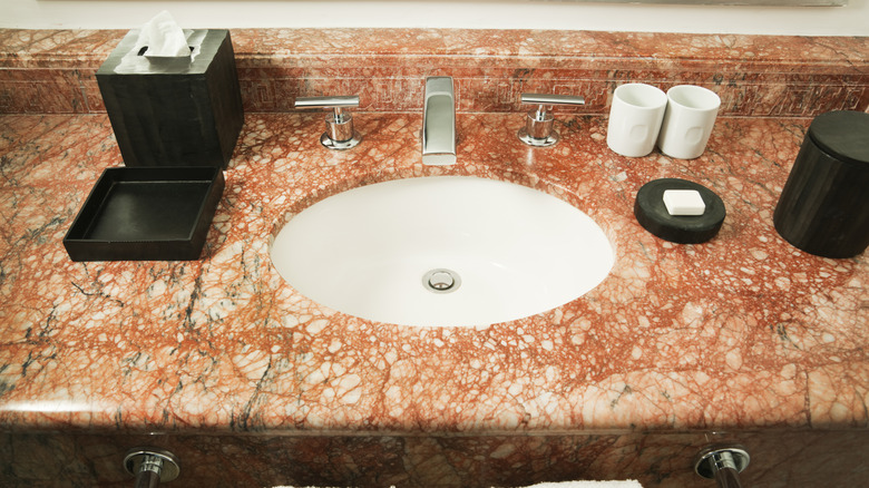 Red marble bathroom sink.