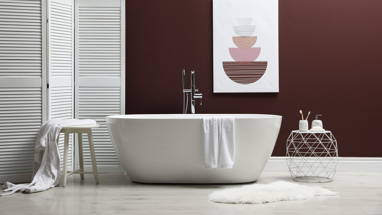 Bathroom with burgundy wall