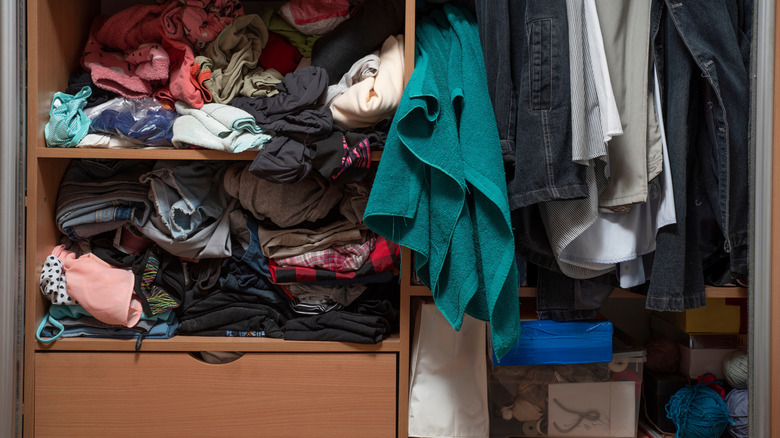 Messy and unorganized closet.