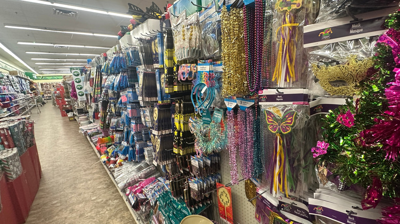 The customer's point of view when looking down an aisle of branded product displays inside a Dollar Tree store in Alberta, Canada, Sept. 5, 2025.