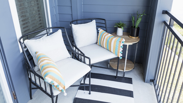 The Brilliant Hack To Keep Your Outdoor Cushions In Place On A