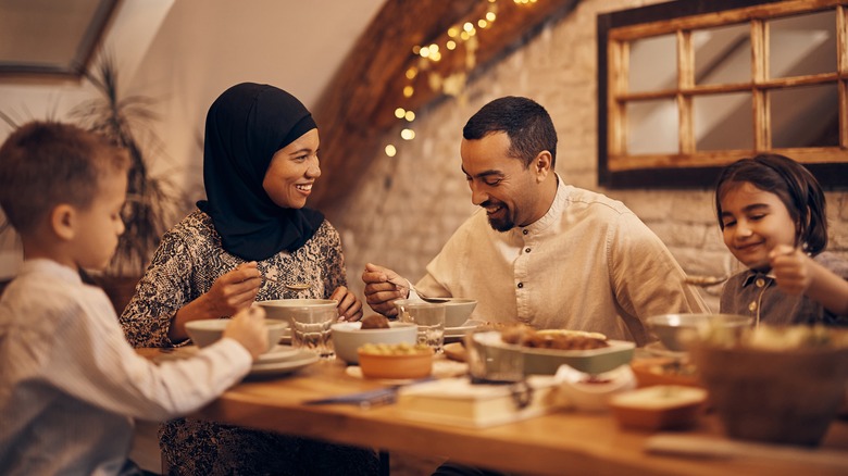 family eating at dining table