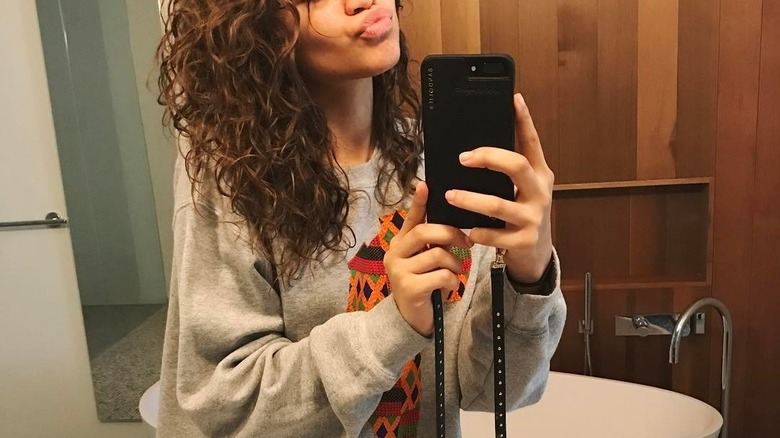 Zendaya taking a selfie in her bathroom