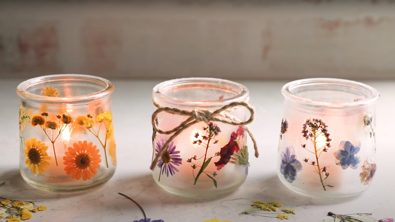 Glass jar lanterns with floral details