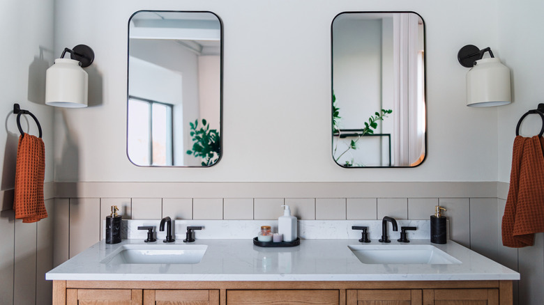 Bathroom with wall sconce lighting